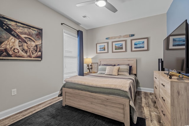 1118 Prescott Cir, Myrtle Beach, SC 29577 - bedroom featuring dark wood finished floors, baseboards, and ceiling fan