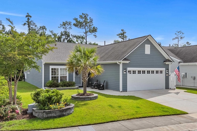 1118 Prescott Cir, Myrtle Beach, SC 29577 - view of front of house featuring an attached garage, a front lawn, driveway, and a shingled roof