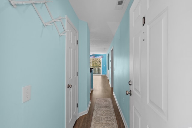 561 White River Dr Unit 11-D, Myrtle Beach, SC 29579 - hall featuring dark wood finished floors and baseboards