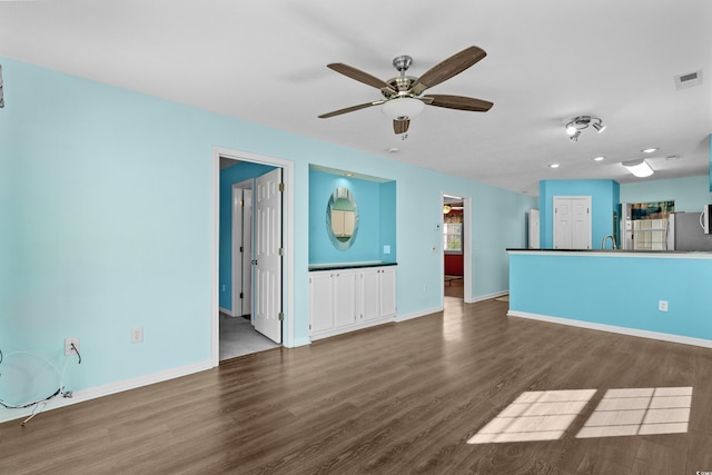561 White River Dr Unit 11-D, Myrtle Beach, SC 29579 - unfurnished living room with ceiling fan, wood finished floors, baseboards, and recessed lighting