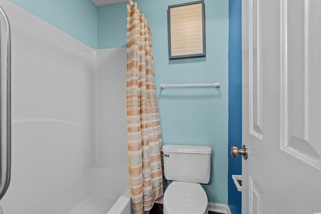 561 White River Dr Unit 11-D, Myrtle Beach, SC 29579 - full bathroom with toilet, shower / bathtub combination with curtain, and baseboards