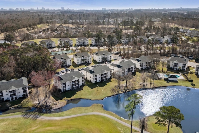 561 White River Dr Unit 11-D, Myrtle Beach, SC 29579 - aerial view of property and surrounding area featuring a large body of water and nearby suburban area