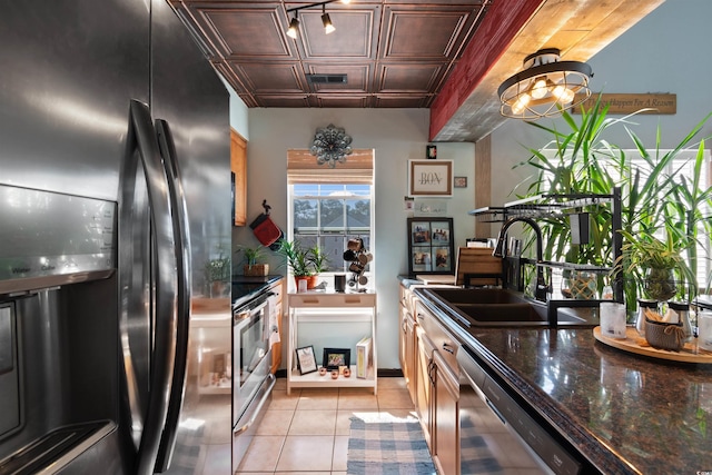 kitchen featuring fridge with ice dispenser, a sink, an ornate ceiling, light tile patterned floors, and dishwasher