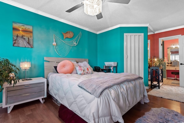 bedroom with ceiling fan, crown molding, wood finished floors, and a textured ceiling