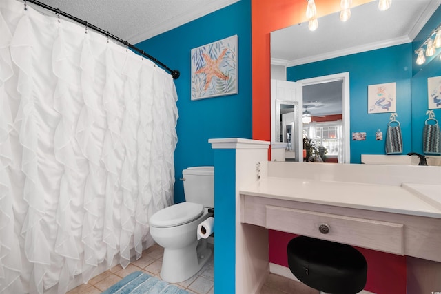 bathroom with vanity, tile patterned floors, toilet, and ornamental molding