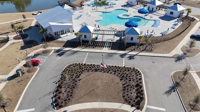 birds eye view of property featuring a water view