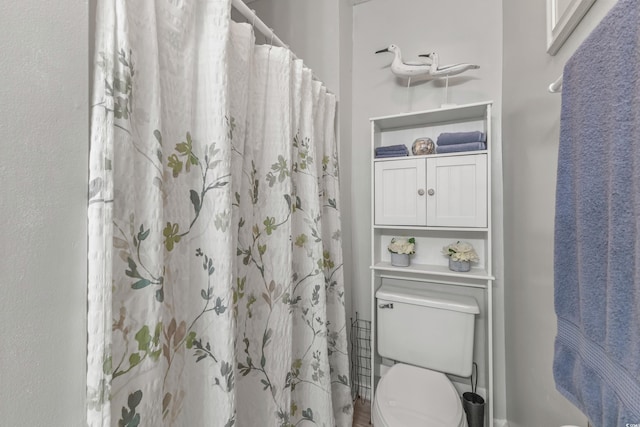 218 Landing Rd Unit G, North Myrtle Beach, SC 29582 - bathroom with toilet and curtained shower
