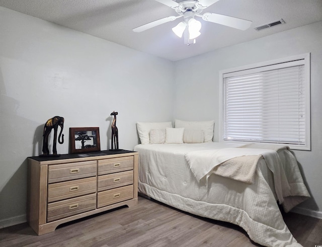 218 Landing Rd Unit G, North Myrtle Beach, SC 29582 - bedroom featuring wood finished floors and a ceiling fan