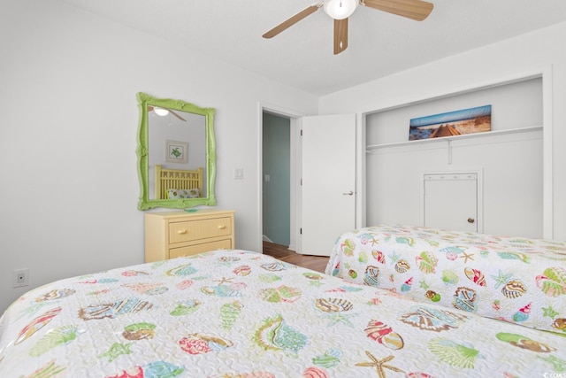 bedroom featuring a closet and a ceiling fan