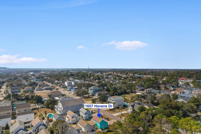 birds eye view of property with a residential view