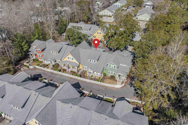 birds eye view of property with a residential view