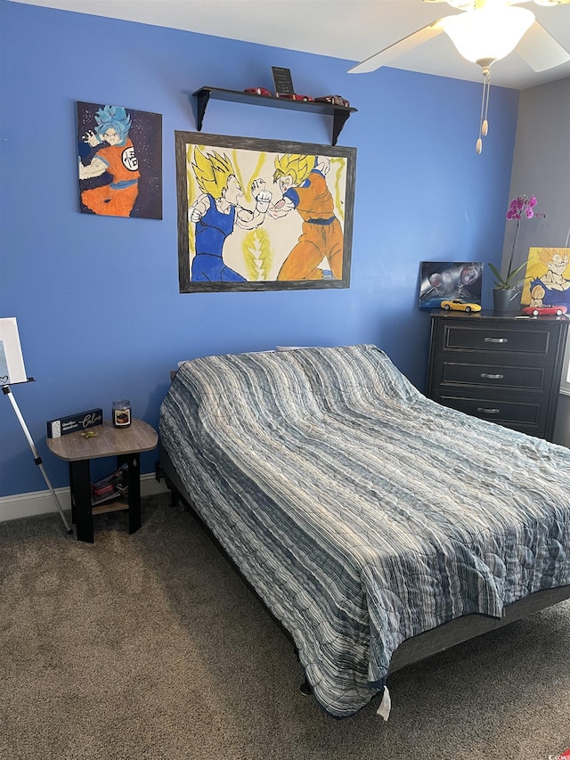 carpeted bedroom featuring baseboards