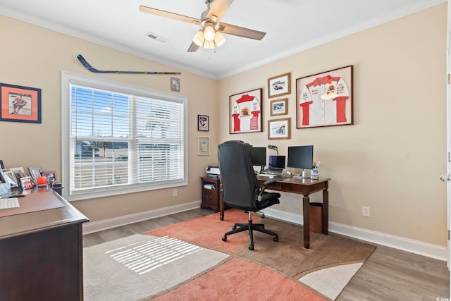 office featuring wood finished floors, visible vents, and crown molding