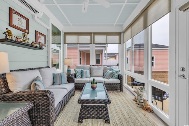 sunroom / solarium with an AC wall unit and a ceiling fan