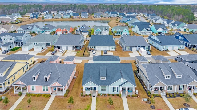 aerial view with a residential view and a water view