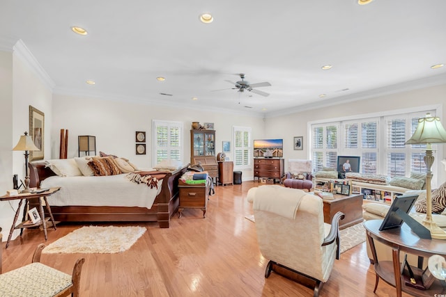 bedroom with recessed lighting, light wood-type flooring, a ceiling fan, and crown molding