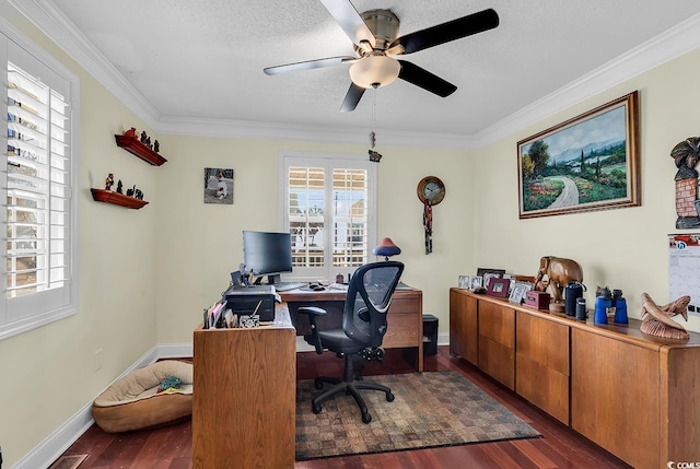 office featuring ornamental molding, dark wood-style flooring, a healthy amount of sunlight, and a ceiling fan