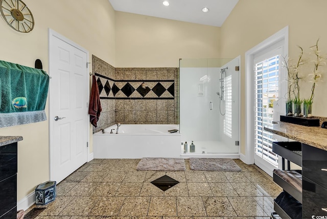 full bath featuring a shower stall, baseboards, a bath, and recessed lighting