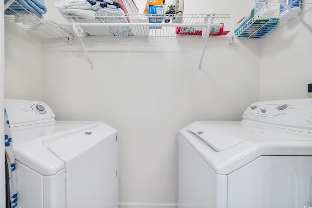 laundry area featuring laundry area and separate washer and dryer