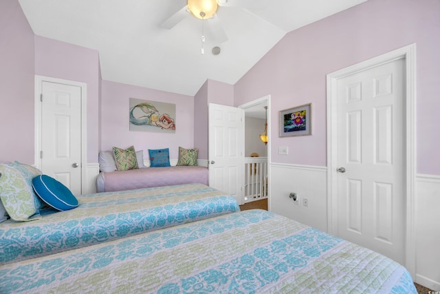 bedroom with lofted ceiling and ceiling fan