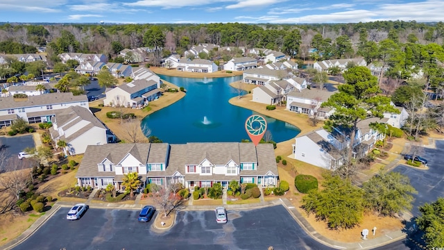 aerial view featuring a water view and a residential view