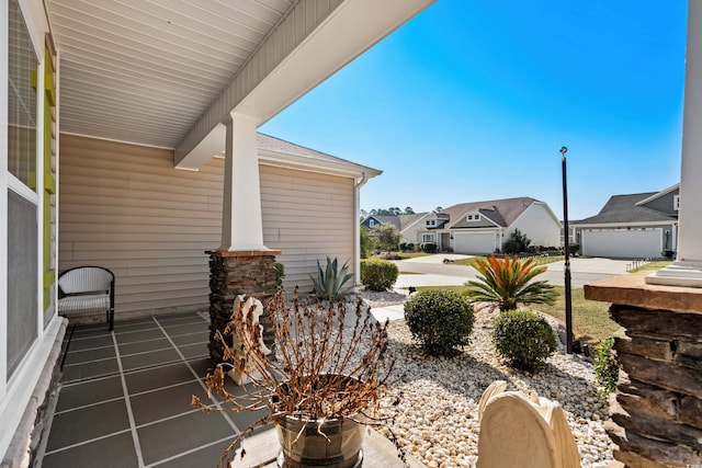 view of patio featuring a residential view