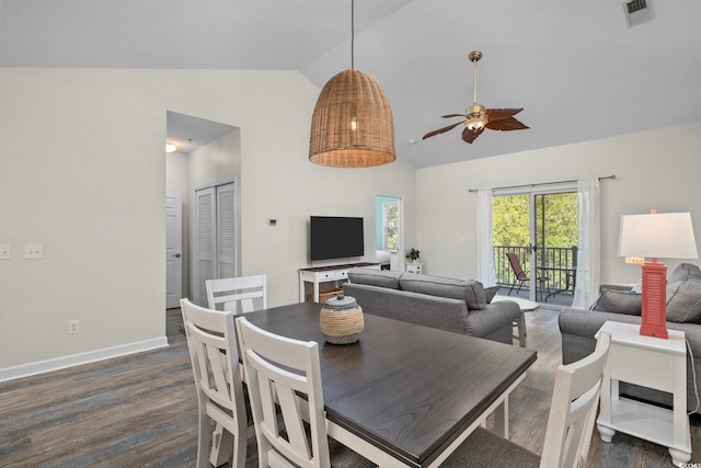 dining space with baseboards, visible vents, a ceiling fan, dark wood-type flooring, and high vaulted ceiling