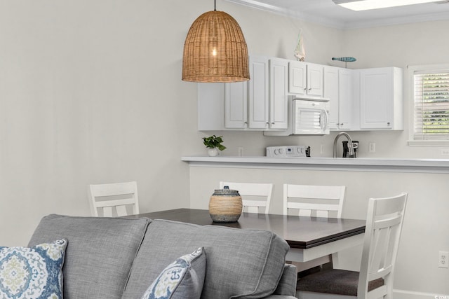 dining room with ornamental molding