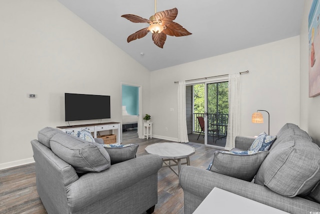 living area featuring high vaulted ceiling, wood finished floors, a ceiling fan, and baseboards