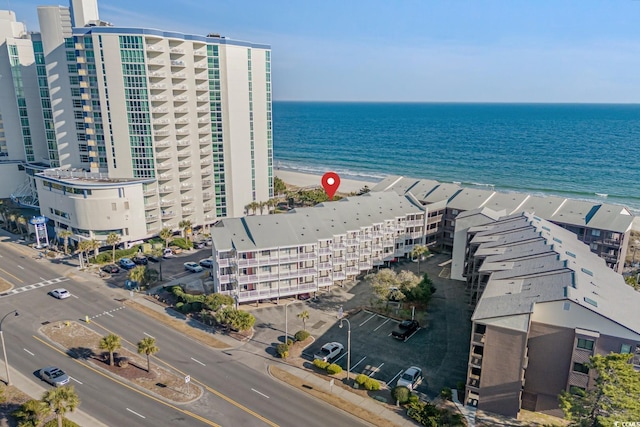 aerial view featuring a water view and a view of the beach