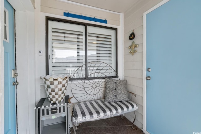 property entrance with covered porch