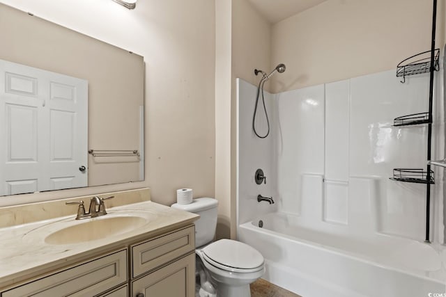 full bath with shower / bath combination, vanity, and toilet