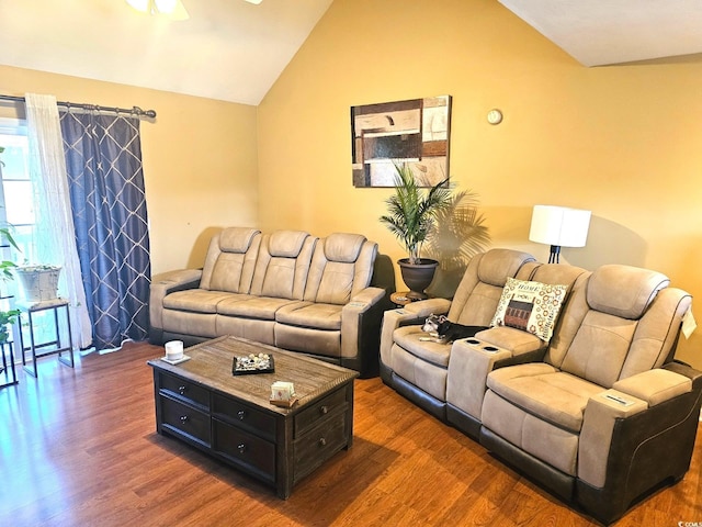 living room with dark wood-style floors and lofted ceiling