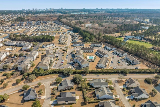 birds eye view of property with a residential view