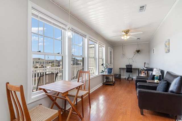 sunroom / solarium featuring visible vents