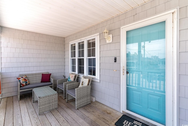 view of exterior entry with an outdoor hangout area