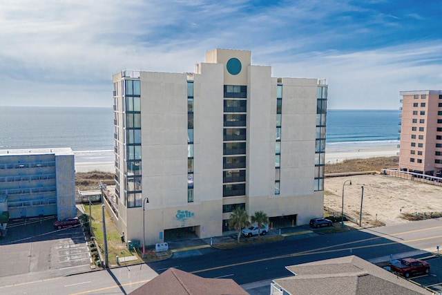 view of building exterior with a water view