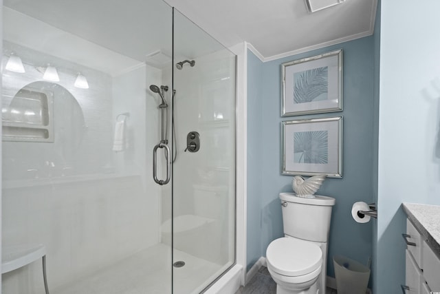 full bath featuring toilet, a shower stall, vanity, and crown molding