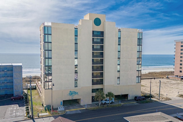 view of building exterior with a water view