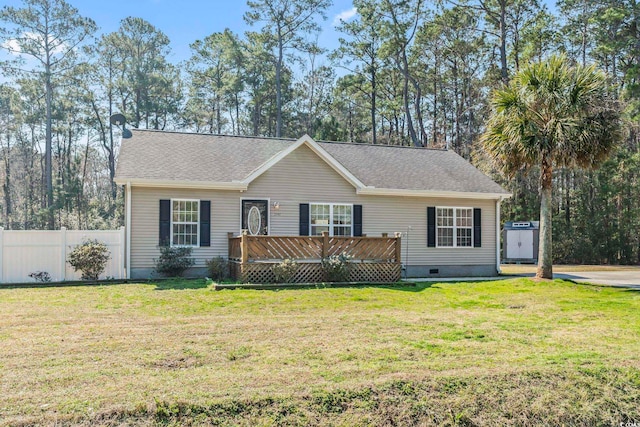 ranch-style house featuring a deck, a shingled roof, fence, crawl space, and a front lawn