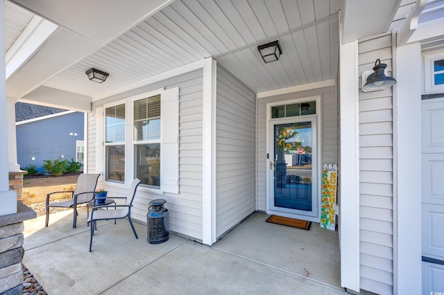 doorway to property featuring a porch