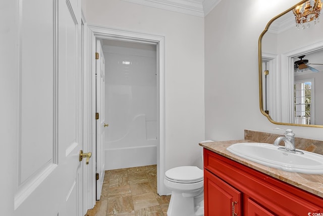 full bath with toilet, a ceiling fan, vanity, and crown molding