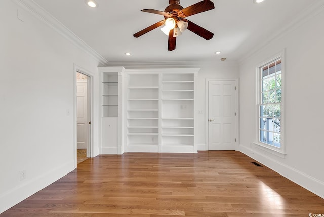 unfurnished bedroom featuring ornamental molding, light wood-type flooring, visible vents, and recessed lighting