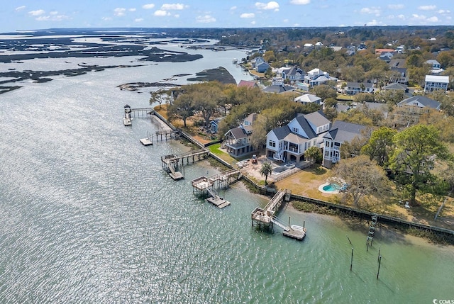 drone / aerial view with a water view