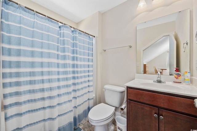 bathroom with toilet, curtained shower, and vanity