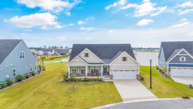 craftsman inspired home featuring a porch, a garage, driveway, a front lawn, and board and batten siding