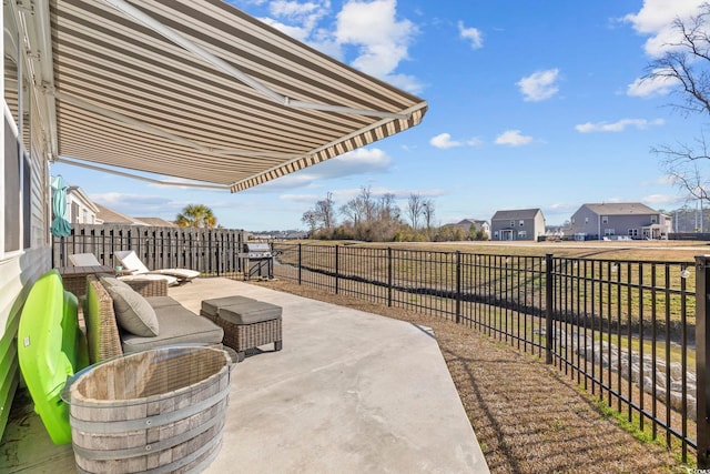 view of patio featuring a fenced backyard