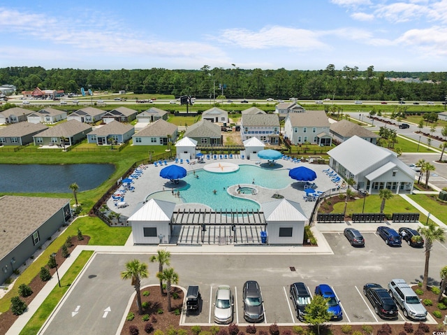 aerial view featuring a water view and a residential view