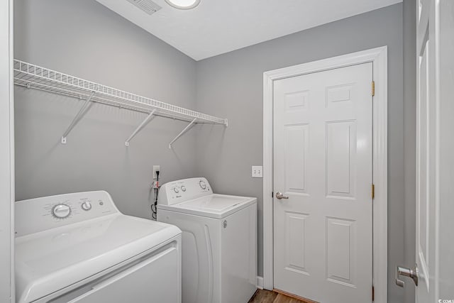 laundry area featuring laundry area, visible vents, and washer and dryer