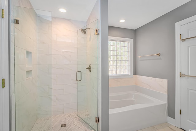 bathroom featuring a garden tub, recessed lighting, and a stall shower